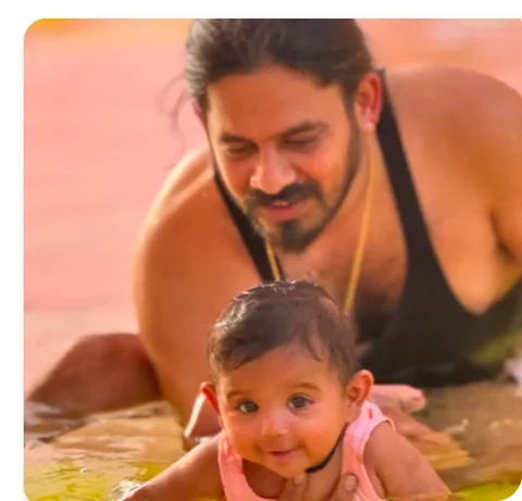 Dad and baby in pool memory