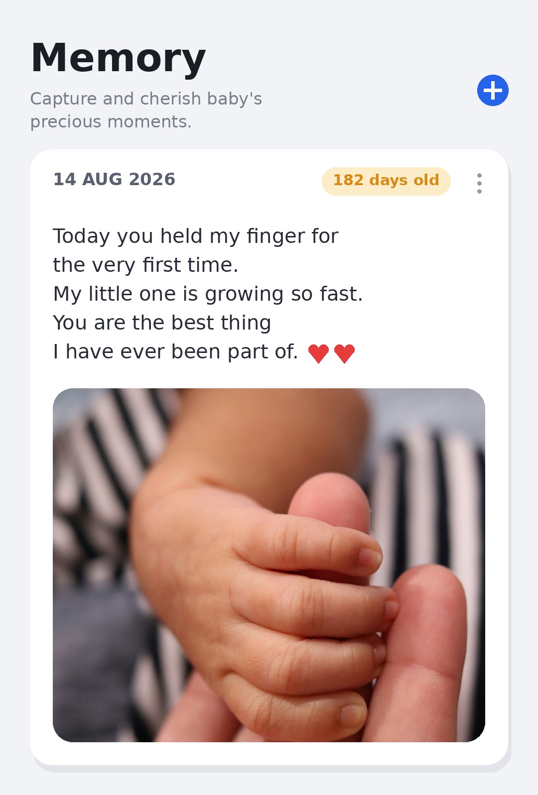 A Memory entry in the Dad's Journey app: a dated journal note that reads "Today you held my finger for the very first time" above a photo of a baby's hand wrapped around a father's finger.